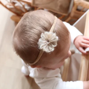Haarbandje wollen bloem beige